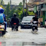 Genangan Air Di Jalanan Bisa Berakibat Fatal Bagi Pengendara